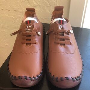 OY soft light brown leather like material size 36